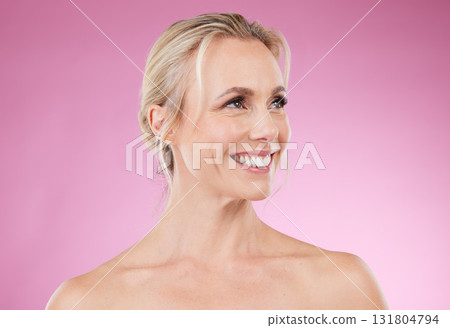 Beauty, dental and profile of woman with smile, glowing skin and natural makeup in studio. Mockup, advertising and luxury skincare cosmetics, face of happy mature model isolated on pink background. Beauty, dental and profile of woman with smile, glowing skin and natural makeup in studio. Mockup, advertising and luxury skincare cosmetics, face of happy mature model isolated on pink background. 131804794