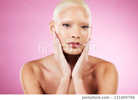 Portrait, skincare and makeup with a model black woman in studio on a pink background for edgy cosmetics. Face, beauty or natural with a unique and attractve young female indoor for cosmetic care 131804798