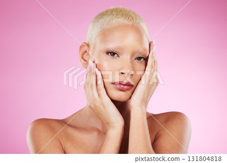 Portrait, beauty and edgy with a model black woman in studio on a pink background for makeup or cosmetics. Face, skincare or natural with a unique and attractve young female indoor for cosmetic care 131804818