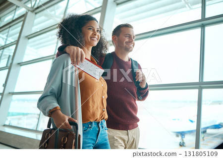 Travel, airport and happy couple with ticket or boarding pass for international flight for holiday destination together. Smile, woman and man with visa for travelling to foreign country for vacation. 131805109