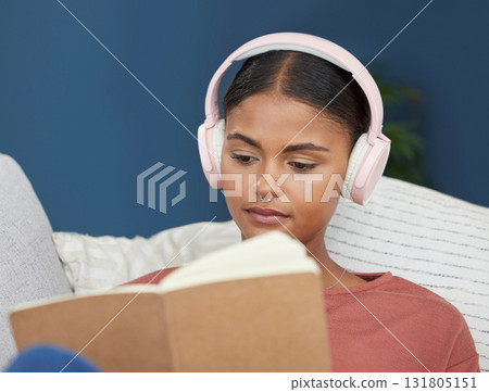 Woman, music headphones and reading book on home sofa to relax, study and for peace in living room. Face of young female student on couch to read for knowledge, education and language on couch Woman, music headphones and reading book on home sofa to relax, study and for peace in living room. Face of young female student on couch to read for knowledge, education and language on couch 131805151