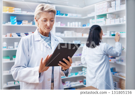 Tablet, senior woman and pharmacist in pharmacy order medication online in drugstore. Healthcare, telehealth technology or elderly female medical doctor with touchscreen for research in medicine shop Tablet, senior woman and pharmacist in pharmacy order medication online in drugstore. Healthcare, telehealth technology or elderly female medical doctor with touchscreen for research in medicine shop 131805156