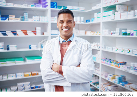 Portrait, man and pharmacist with arms crossed in pharmacy or drugstore. Healthcare, wellness and happy, proud and confident smile of male medical professional, expert or doctor from Canada in shop. 131805162