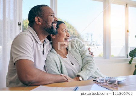 Love, laughing and hugging with a senior couple in their home, sitting by a table while thinking of a future retirement. Comic, funny or humor with a mature man and woman bonding together in a house Love, laughing and hugging with a senior couple in their home, sitting by a table while thinking of a future retirement. Comic, funny or humor with a mature man and woman bonding together in a house 131805763