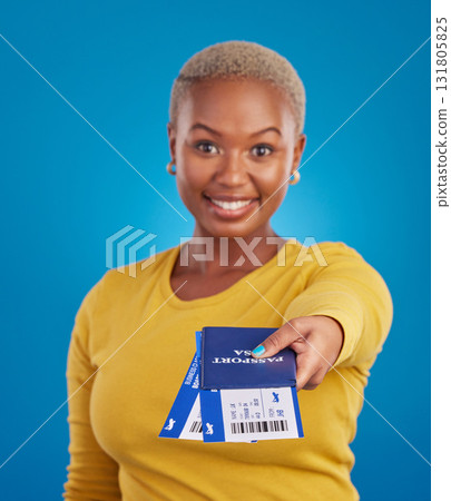 Giving passport, travel tickets and portrait of black woman in studio with flight documents, boarding pass and ID. Traveling agency, hand out and girl smile for immigration, holiday and global trip 131805825