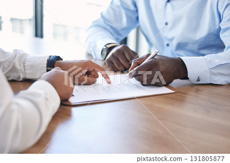 Hand, signature and contract with a business man in a meeting with human resources for performance review. Documents, hiring and recruitment with a male employee signing paperwork in an office Hand, signature and contract with a business man in a meeting with human resources for performance review. Documents, hiring and recruitment with a male employee signing paperwork in an office 131805877