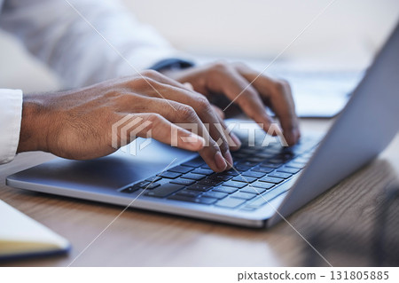 Laptop, office and hands typing at desk for online documents, writing email and business proposal. Technology, networking and zoom of businessman on computer for research, report and website review Laptop, office and hands typing at desk for online documents, writing email and business proposal. Technology, networking and zoom of businessman on computer for research, report and website review 131805885