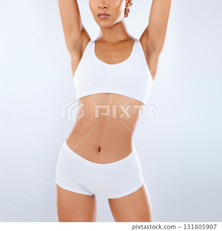 Body, fitness and black woman with underwear, workout and healthy lifestyle on grey studio background. Female, lady and athlete with nutrition, diet and training for wellness, slimming or weight loss 131805907