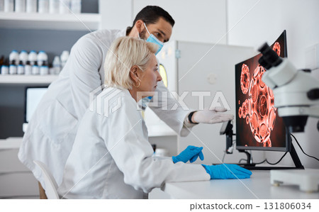 Computer, covid and science in a medical research laboratory using technology for analytics of a virus on screen. Team, teamwork and technician looking at microscopic image with expert 131806034