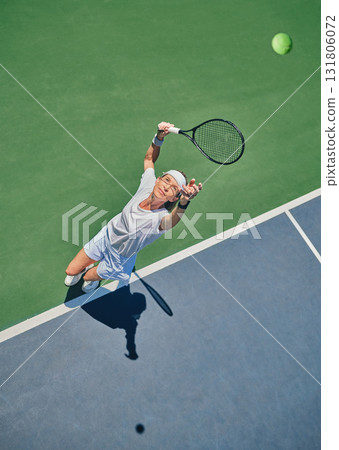 Tennis serve, sport and woman on outdoor court, fitness motivation and competition with athlete training for game. Workout, healthy and player on turf, active with exercise and sports action top view Tennis serve, sport and woman on outdoor court, fitness motivation and competition with athlete training for game. Workout, healthy and player on turf, active with exercise and sports action top view 131806072