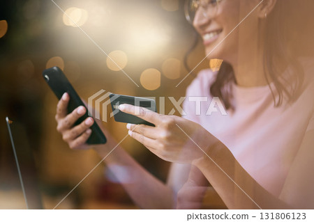 Credit card, online shopping and woman with mockup for advertising, ecommerce and bokeh background. Payment, fintech and girl happy with savings, budget and cash or finance transfer on smartphone app Credit card, online shopping and woman with mockup for advertising, ecommerce and bokeh background. Payment, fintech and girl happy with savings, budget and cash or finance transfer on smartphone app 131806123