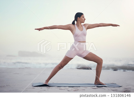Woman, yoga pose and posture at beach for wellness, peace and zen, balance and sea background. Fitness, girl and meditation, training and energy outdoor for peaceful, mindset and chakra workout 131806146