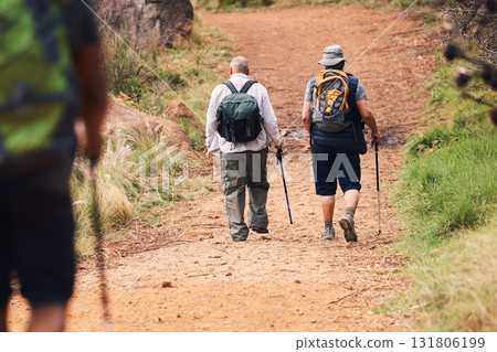 Hiking, fitness and friends walking on mountain for adventure, freedom and sports in outdoor forest. Travel, retirement and senior hikers for exercise wellness, trekking and cardio workout in nature Hiking, fitness and friends walking on mountain for adventure, freedom and sports in outdoor forest. Travel, retirement and senior hikers for exercise wellness, trekking and cardio workout in nature 131806199