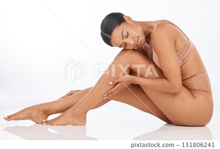 Beauty, underwear and legs black woman isolated on a white background for dream body, aesthetic or skincare. USA model or person for dermatology, epilation or hair removal results on studio mockup Beauty, underwear and legs black woman isolated on a white background for dream body, aesthetic or skincare. USA model or person for dermatology, epilation or hair removal results on studio mockup 131806241