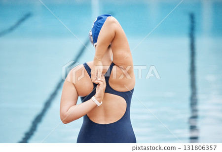 Health, sports and stretching with woman at swimming pool for fitness, workout and training. Wellness, water polo and warm up with arm of girl athlete for cardio, endurance and exercise goals 131806357
