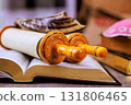 During Jewish holiday Rosh Hashanah with Torah scroll religious texts shofar on table create atmosphere 131806465