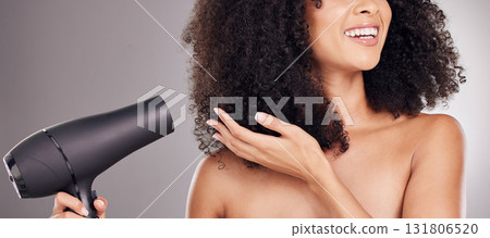 Hair care, beauty and black woman with hairdryer in studio isolated on gray background. Curly haircare, aesthetic or happy female model with machine to dry hairstyle after salon treatment for growth. Hair care, beauty and black woman with hairdryer in studio isolated on gray background. Curly haircare, aesthetic or happy female model with machine to dry hairstyle after salon treatment for growth. 131806520