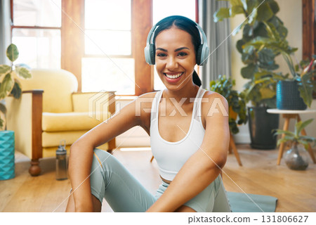 Fitness, headphones or portrait of happy woman in yoga for body flexibility, wellness or healthy lifestyle. Smile, listening or music for pilates girl in exercise, workout or training in house studio 131806627