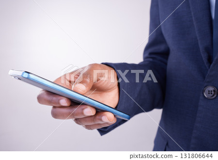 Hands, man and smartphone texting in white background for business app, planning and internet search. Closeup male, mobile typing and studio connection on technology, corporate networking and contact Hands, man and smartphone texting in white background for business app, planning and internet search. Closeup male, mobile typing and studio connection on technology, corporate networking and contact 131806644