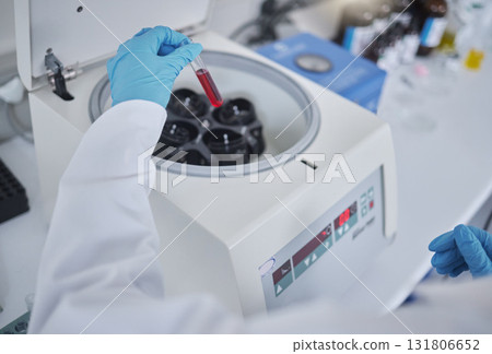 Hands, test tube or laboratory centrifuge in science research, person dna engineering or data analytics. Zoom, scientist or blood vial in medical equipment, particles separation or vaccine innovation 131806652
