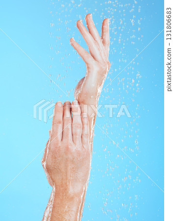 Woman, hands and water drops, hygiene and handwashing, skincare and moisture on blue background. Natural, sustainability and wellness with eco friendly dermatology, shower and cleaning for health Woman, hands and water drops, hygiene and handwashing, skincare and moisture on blue background. Natural, sustainability and wellness with eco friendly dermatology, shower and cleaning for health 131806683