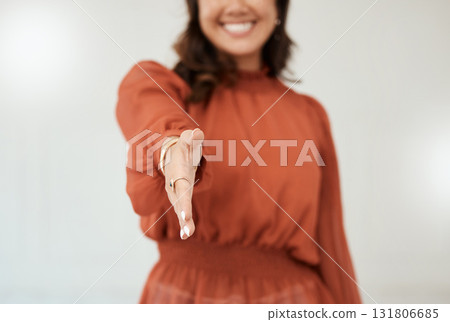 Business woman, handshake and smile for meeting, greeting or recruitment hiring at the office. Hand of happy female recruiter shaking hands for thank you, welcome or deal in agreement at workplace 131806685