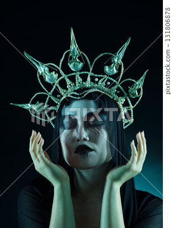 Makeup, dark art and queen woman isolated on black background for fantasy, macabre and beauty character. Vampire, fashion and crown of avatar person or model with cosmetics in night studio mockup 131806878