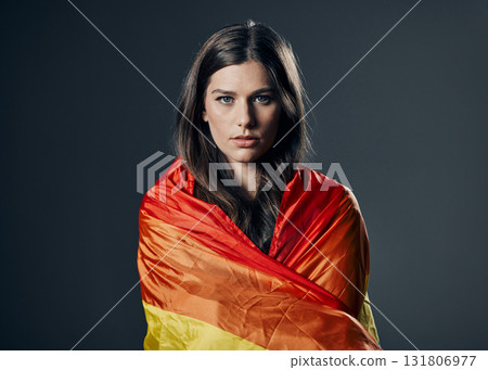 Flag, pride and woman in portrait, lgbtq and freedom to love, inclusion and equality, protest for human rights. Gay, trans and lesbian, politics and identity with lgbt community on studio background Flag, pride and woman in portrait, lgbtq and freedom to love, inclusion and equality, protest for human rights. Gay, trans and lesbian, politics and identity with lgbt community on studio background 131806977