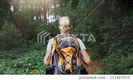 Travel, forest and woman rear on hiking journey, jungle adventure or nature wellness and outdoor explore. Fitness, walking and hiker person in backpack trekking, tropical woods path and cardio health Travel, forest and woman rear on hiking journey, jungle adventure or nature wellness and outdoor explore. Fitness, walking and hiker person in backpack trekking, tropical woods path and cardio health 131807033