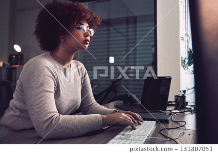 Night, computer typing and black woman programmer, software developer and cybersecurity internship. Coding, programming and USA person or developer data analytics, information technology and research 131807051