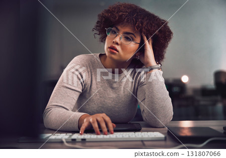 Thinking, confused and night with a black woman programmer working late in her office for cybersecurity. Idea, doubt and overtime with a female developer at work for research or data analysis 131807066