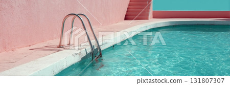 Bright Turquoise Water Shines Beside a Pastel Pink Wall and Steps During a Sunny Day by the Pool 131807307