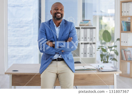 Happy black man, arms crossed and mature portrait in corporate office, company about us or profile picture of CEO introduction. Smile, confident and management person with financial success mindset Happy black man, arms crossed and mature portrait in corporate office, company about us or profile picture of CEO introduction. Smile, confident and management person with financial success mindset 131807367