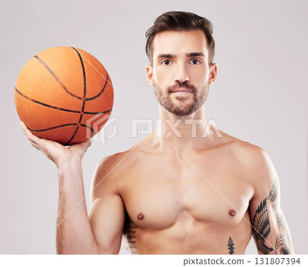 Portrait, basketball and man with fitness, sport and exercise with motivation on grey studio background. Face, male athlete and player with training, workout or practice for tournament or competition Portrait, basketball and man with fitness, sport and exercise with motivation on grey studio background. Face, male athlete and player with training, workout or practice for tournament or competition 131807394