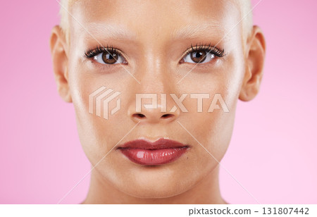 Black woman, portrait and beauty cosmetics of a young model with makeup and skincare. Isolated, pink background and studio with a female feeling calm from spa wellness, dermatology and face skin glow Black woman, portrait and beauty cosmetics of a young model with makeup and skincare. Isolated, pink background and studio with a female feeling calm from spa wellness, dermatology and face skin glow 131807442