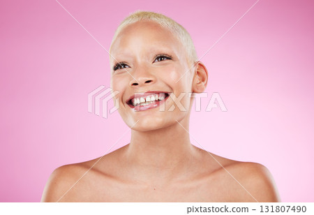 Beauty, black woman and unique smile of a model with skincare, wellness and happiness, Isolated, pink background and studio with a young person happy about cosmetics, dermatology and facial detox Beauty, black woman and unique smile of a model with skincare, wellness and happiness, Isolated, pink background and studio with a young person happy about cosmetics, dermatology and facial detox 131807490