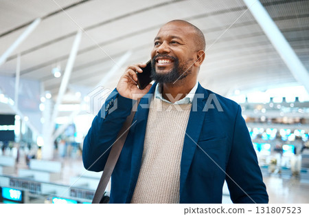 Black man, airport and business call with a smile ready for plane travel and global work. Mobile connection, happiness and businessman with luggage for plane and executive networking on cellphone Black man, airport and business call with a smile ready for plane travel and global work. Mobile connection, happiness and businessman with luggage for plane and executive networking on cellphone 131807523