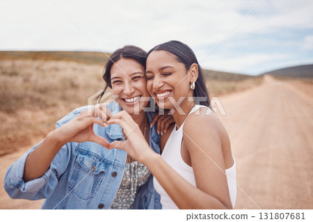 Friendship, heart shape and women in nature on a holiday, adventure or weekend trip together. Happy, smile and female best friends with love hand gesture, sign or emoji on vacation in the countryside Friendship, heart shape and women in nature on a holiday, adventure or weekend trip together. Happy, smile and female best friends with love hand gesture, sign or emoji on vacation in the countryside 131807681