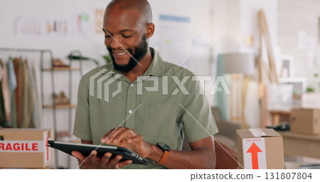 Tablet, box or black man designer online for delivery in a workshop for shipping product or courier. Computer, ecommerce order logistics or African business owner with stock or the shipment of goods 131807804