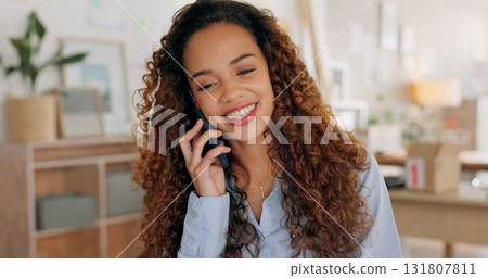 Phone call, startup and young woman in the office for creative, fashion or artistic career. Communication, small business and happy female designer from Mexico on a mobile conversation with cellphone 131807811
