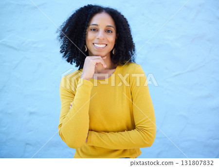 Portrait, proud and black woman in studio on mockup, space and blue background for advertising. Face, smile and girl relax on backdrop, cheerful and confident, cool and posing inside on copy space Portrait, proud and black woman in studio on mockup, space and blue background for advertising. Face, smile and girl relax on backdrop, cheerful and confident, cool and posing inside on copy space 131807832