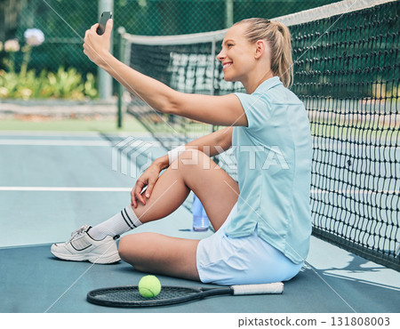Tennis, woman and selfie at court during training, fitness and morning routine outdoors. Sports, girl and smartphone photo before match, performance or exercise, workout and smile for profile picture Tennis, woman and selfie at court during training, fitness and morning routine outdoors. Sports, girl and smartphone photo before match, performance or exercise, workout and smile for profile picture 131808003