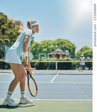 Tennis, woman and sports match on court for fitness, exercise and training for competition. Person serving at club for game, workout and performance for health and wellness with summer cardio outdoor 131808004