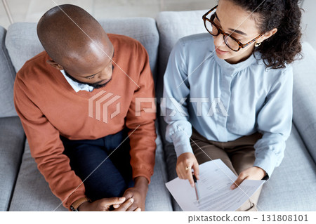 Contract, health agreement and black man with woman sign paperwork, medical insurance and legal document. Talk, doctor in psychology and patient top view, consultation to explain terms and conditions Contract, health agreement and black man with woman sign paperwork, medical insurance and legal document. Talk, doctor in psychology and patient top view, consultation to explain terms and conditions 131808101