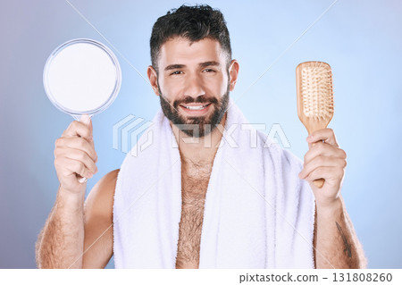 Portrait, hair and mirror by man in studio for styling, treatment and product advertising on gradient background. Face, haircare and male model relax for brushing, hairstyle or grooming and isolated 131808260