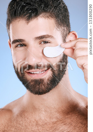 Beauty patch, eyes and portrait of man in studio for dermatology, skincare and glow. Male model, face and eye care product for body mask, healthy cosmetics and wellness of facial collagen treatment Beauty patch, eyes and portrait of man in studio for dermatology, skincare and glow. Male model, face and eye care product for body mask, healthy cosmetics and wellness of facial collagen treatment 131808290