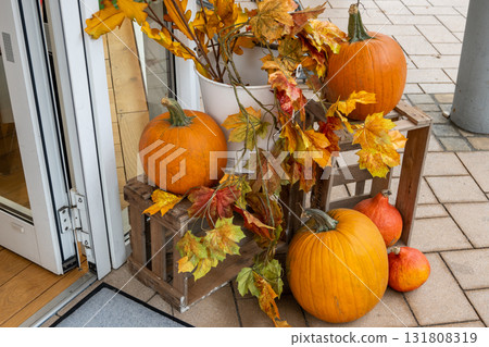 Batch orange fresh pumpkins on the street. Autumn nature background for decoration.  131808319