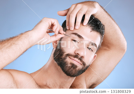 Cleaning, beauty and hair removal with eyebrow of man and tweezers for grooming, skincare and maintenance. Hygiene, cosmetics and self care with face of model shaping facial growth for treatment 131808329