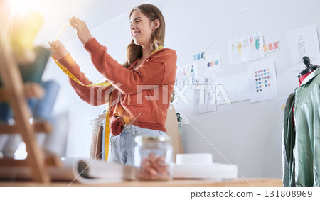 Business woman, fashion and design with tape measure for garment, clothing or precision at the workshop. Female fashion designer or tailor with smile for working on clothes measuring sizes for market Business woman, fashion and design with tape measure for garment, clothing or precision at the workshop. Female fashion designer or tailor with smile for working on clothes measuring sizes for market 131808969