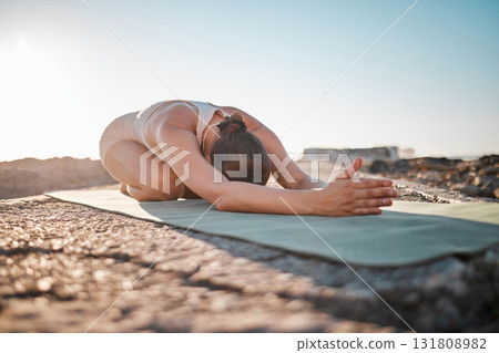 Exercise, yoga and woman stretching on rock for healthy lifestyle, body wellness and cardio workout. Sports, pilates training and girl do meditation, stretch and fitness for zen mindfulness outdoors Exercise, yoga and woman stretching on rock for healthy lifestyle, body wellness and cardio workout. Sports, pilates training and girl do meditation, stretch and fitness for zen mindfulness outdoors 131808982
